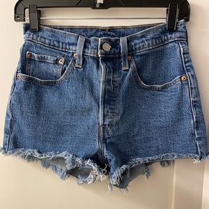 Levi’s 501 distressed blue Jean shorts